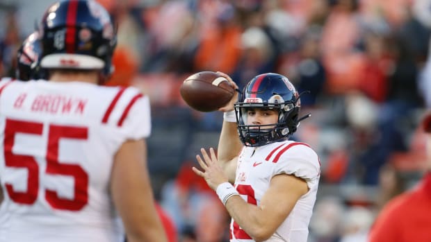 Mississippi Rebels quarterback John Rhys Plumlee (10) warms up before a game against the Auburn Tigers at Jordan-Hare Stadium. Mandatory Credit: John Reed-USA TODAY Sports